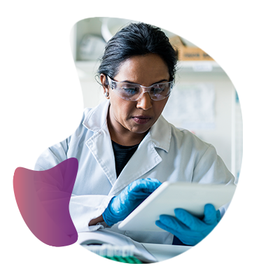 female scientist working on a tablet in a lab